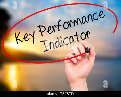 Man Hand writing Key Performance Indicator with black marker on visual ...