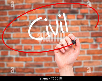 Man Hand writing Civil with black marker on visual screen Stock Photo