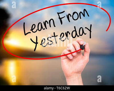 Man Hand writing Learn From Yesterday with black marker on visual ...