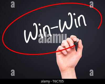 Man Hand writing Win-Win  with black marker on visual screen Stock Photo