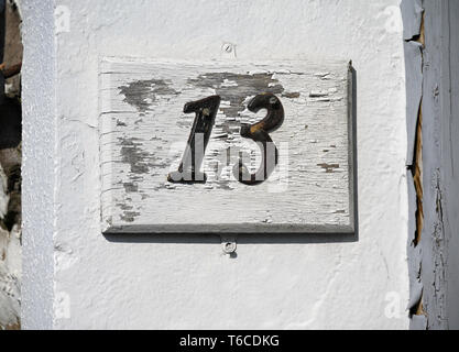 13, House Number on painted wooden plaque. Captain French Lane, Kendal, Cumbria, England, United Kingdom, Europe. Stock Photo