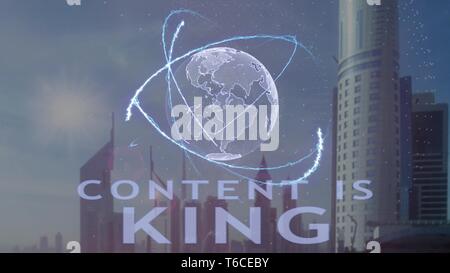 Content is King text with 3d hologram of the planet Earth against the backdrop of the modern metropolis Stock Photo