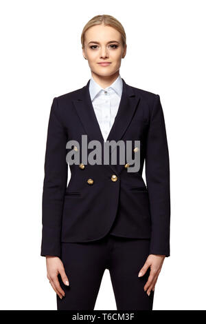 Studio portrait of young confident elegant businesswoman in a dark business suit. Stock Photo