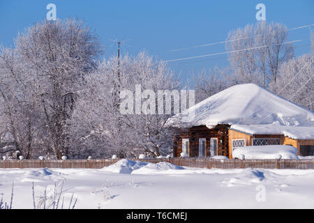 House under snow in Russian village Stock Photo - Alamy