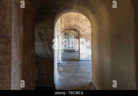 Stone arches inside The Round Tower, a permanent fortification made from stone in Old Portsmouth, Hampshire, England, UK. Stock Photo