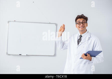 Funny doctor scientist making presentation in hospital Stock Photo