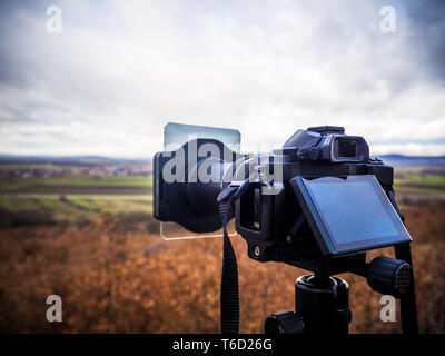 Shooting landscape with mirrorless camera in bad condition Stock Photo