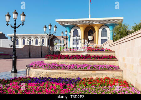 Middle East, Oman, Muscat. Rows of colourful flowers planted in front of Al Alam, the Sultan's Palace in Old Muscat. Stock Photo