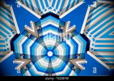 Abstract blue stripey beach hut image created using a kaleidoscope filter. Stock Photo