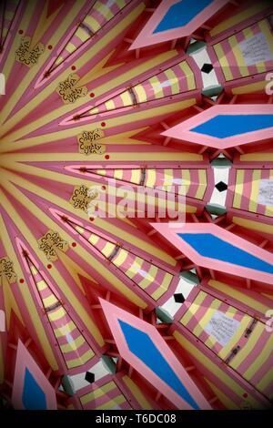 Abstract beach hut image created using a kaleidoscope filter. Essex coast, UK. May 2018. Stock Photo