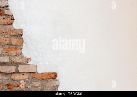 White plaster with old vintage red brick wall banner background Stock Photo