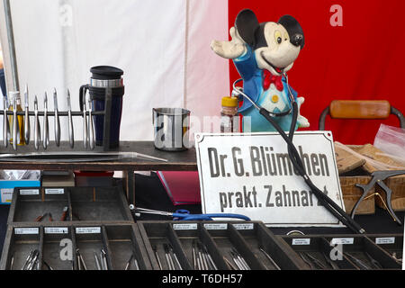 MUNICH, GERMANY Tweezers, dentistry tools and a stethoscope on sell (with Micky Mouse) at the annual open air giant flea market in Munich Stock Photo