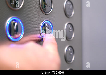 Tactile digit icons for the visually impaired. Elevator buttons. Voice notification sound for the blind. Selective focus close-up Stock Photo