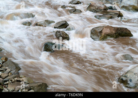 Rapids of the Urubamba River at Aguas Calientes in Peru after heavy rain Stock Photo