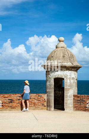 Sentry house and woman, San Cristobal Castle, San Juan National Historic Site, Old San Juan, Puerto Rico Stock Photo