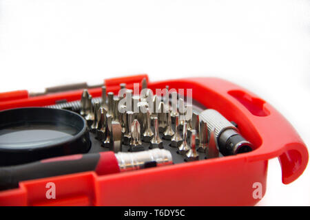 Set of precision screwdrivers isolated on white background. Instruments. Repair phone and small items. Stock Photo