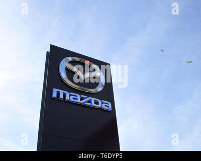 Sign With The Logo Of Mazda Motor Corporation Japanese Multinational Automaker Based In Fuchu Aki District Hiroshima Prefecture Japan Copenhagen Stock Photo Alamy