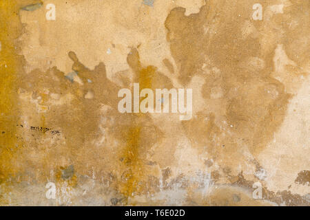 stained plastered beige wall for backgrounds Stock Photo
