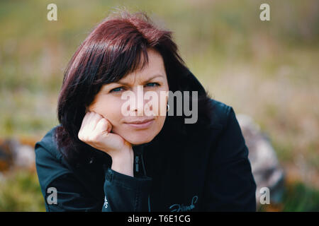 outdoor fashion Beauty Portrait of middle age woman Stock Photo