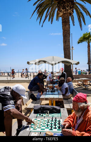 Playing chess on Santa Monica Beach in Los Angeles, California, USA Stock Photo