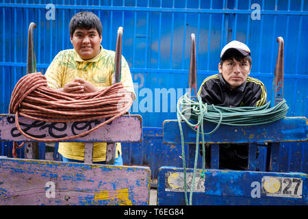 Porters waiting for clients near the Central Market or Mercado Central in Lima, Peru Stock Photo