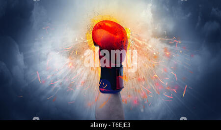 Hand hits strongly and makes fire beam around  Stock Photo