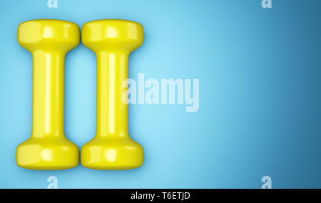 yellow dumbbells isolated on blue background Stock Photo
