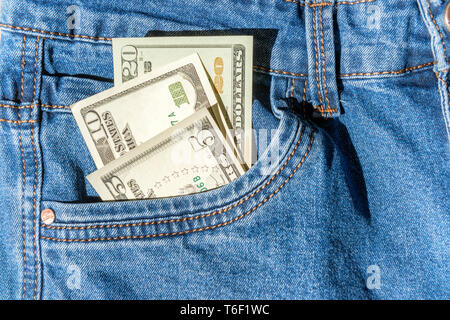 Money in blue jeans pocket Stock Photo