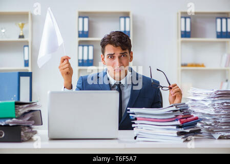 Businessman throwing white flag and giving up Stock Photo