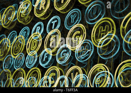 Neon typewriter keys close up Stock Photo