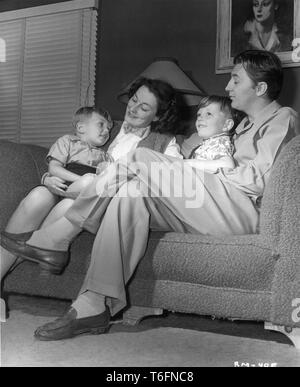 ROBERT MITCHUM at home with wife Dorothy and sons James and Christopher photo by Ernest A. Bachrach 1947 RKO Radio Pictures, Inc. Stock Photo