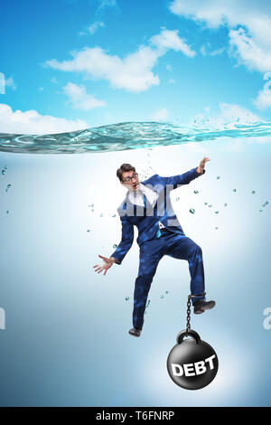 Businessman drowning in concept of high debt Stock Photo