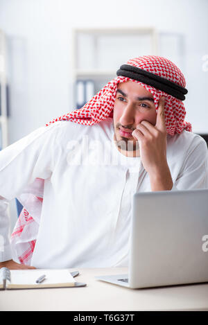 Arab businessman working in the office Stock Photo