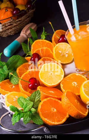 freshly squeezed orange juice with ice in glass Stock Photo
