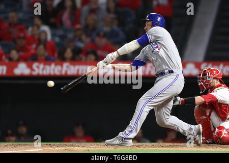 Los Angeles, USA. April 30, 2019: Toronto Blue Jays catcher Luke Maile (21) makes contact at the plate during the game between the Toronto Blue Jays and the Los Angeles Angels of Anaheim at Angel Stadium in Anaheim, CA, (Photo by Peter Joneleit, Cal Sport Media) Credit: Cal Sport Media/Alamy Live News Stock Photo