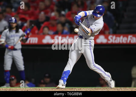 Los Angeles, USA. April 30, 2019: Toronto Blue Jays catcher Brett Wright (22) makes contact at the plate during the game between the Toronto Blue Jays and the Los Angeles Angels of Anaheim at Angel Stadium in Anaheim, CA, (Photo by Peter Joneleit, Cal Sport Media) Credit: Cal Sport Media/Alamy Live News Stock Photo