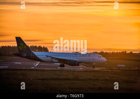 Cork Airport, Cork, Ireland. 01st May, 2019. An Aer Lingus Aibus A320 with brand new livery accelerates down runway 16/34 at dawn on a bright morning for a flight to Barcelona  from Cork Airport, Cork, Ireland. Credit: David Creedon/Alamy Live News Stock Photo