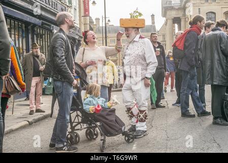 Oxford, England, UK. 1st May, 2019. Revellers see in the spring during May Morning in Oxford, UK. Every year for 500 years people have gathered at 6am to listen to the choristers of Magdalen college sing from the great tower. Crowds of onlookers, many of whom had been up all night partying, dance to street bands and join in with traditional Morris dancing. Credit: Rod Harbinson/ZUMA Wire/Alamy Live News Stock Photo
