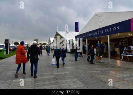 Badminton, Gloucestershire, UK. 1st May 2019. UK Weather: On a wet and damp afternoon visitors seen walking between trade stands at the 70th Anniversary of The Mitsubishi Motors Badminton Horse Trials.Picture Credit: Robert Timoney/Alamy Live News Stock Photo