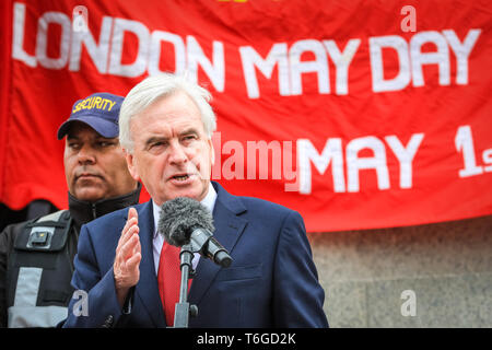 London, UK, 1st May 2019.  John McDonnell,  Shadow Chancellor of the Exchequer and Labour MP, speaks at the rally. Protesters at the rally in Trafalgar Square.The annual London May Day march makes its way from Clerkenwell Green and finishes in a rally in Trafalgar Square, where speakers including trade union representatives, human rights organisations and politicians celebrate International Workers Day. Credit: Imageplotter/Alamy Live News Stock Photo
