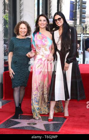 Los Angeles, CA, USA. 1st May, 2019. Rhea Perlman, Lucy Liu, Demi Moore at the induction ceremony for Star on the Hollywood Walk of Fame for Lucy Liu, Hollywood Boulevard, Los Angeles, CA May 1, 2019. Credit: Priscilla Grant/Everett Collection/Alamy Live News Stock Photo