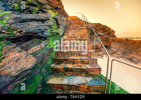 Stairs to the Beach of the Cathedrals in the evening Stock Photo