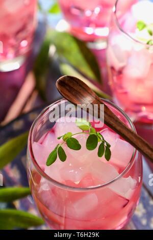 Es Nata de Coco, the Icy Dessert Drink of Coconut Jelly in Red Cocopandan Syrup Stock Photo