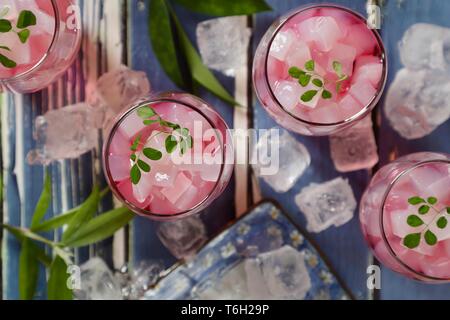 Es Nata de Coco, the Icy Dessert Drink of Coconut Jelly in Red Cocopandan Syrup Stock Photo