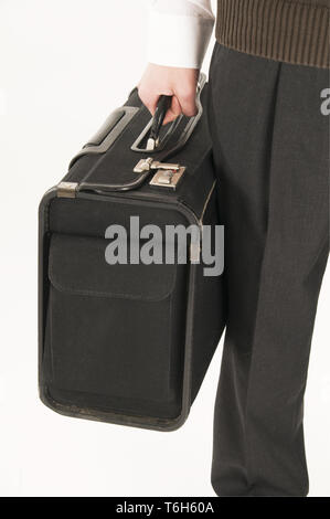 clutch the suitcase Stock Photo