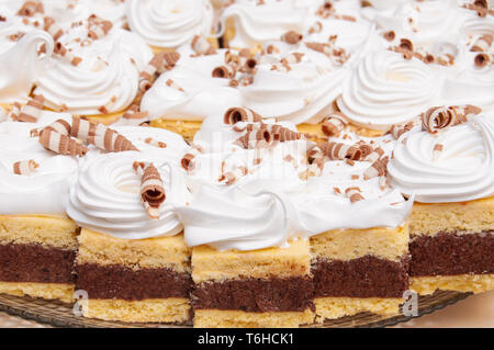 cookies with white meringue and chocolate curly flakes Stock Photo