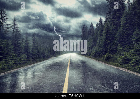 Storm with rain and lightning on the street Stock Photo