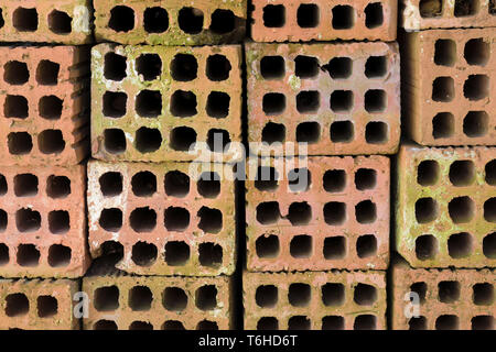 Hollow red bricks, patterned background Stock Photo