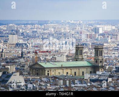 Aerial view on the center of Paris as seen from Montmartre, with the Church of St Vincent de Paul,  in the 10th arrondissement of Paris. Stock Photo