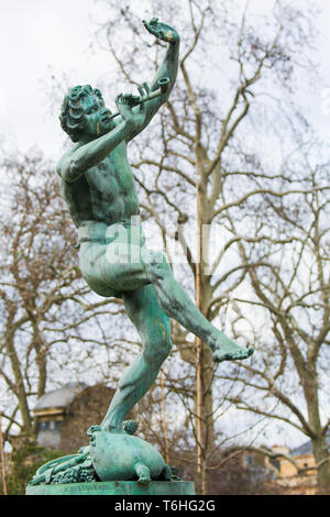 Bronze Statue of a Dancing Faun in the Jardin de Luxembourg, Paris, France Stock Photo